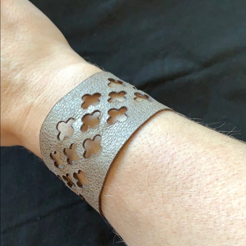 Leather cuff with punch cut pattern